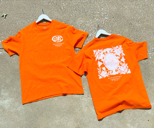 Orange “NBC co.” T-shirt