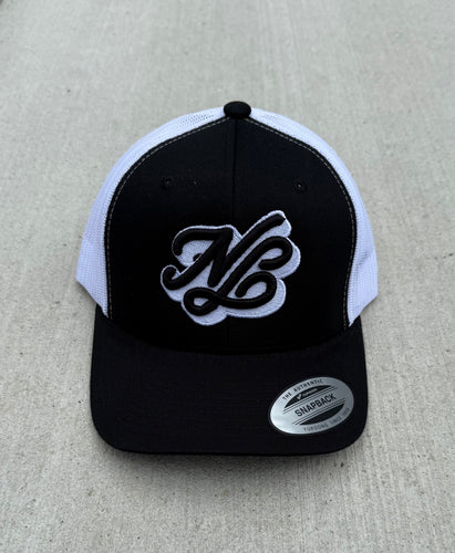 Black and white “NB Cursive” Trucker.